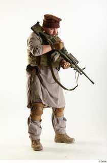 Photos Luis Donovan Army Taliban Gunner Poses charging gun standing…